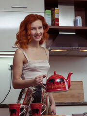 Delightful ginger Ambre assists up a yummy treat starting with her delicious pink muff