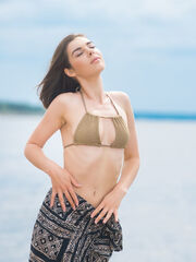 Dakota A flaunts off her captivating body at the beach
