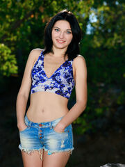Florina is shiny-eyed cutie with a eating, amazing smile and dainty but tanned body