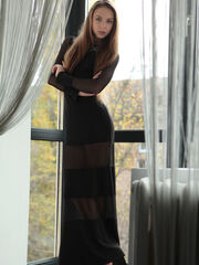 Sultry Valery Leche takes off her black dress by the window caring her stacked body